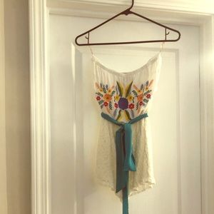 White embroidered sleeveless romper